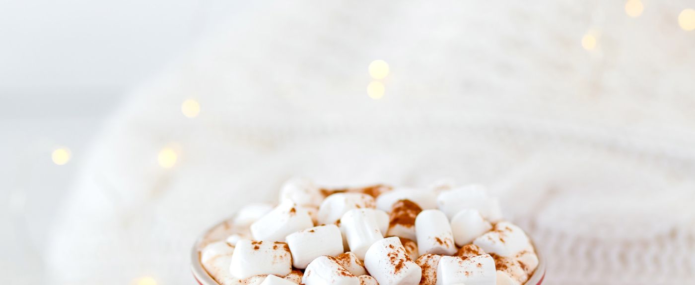 Holiday-themed hot chocolate with marshmallows