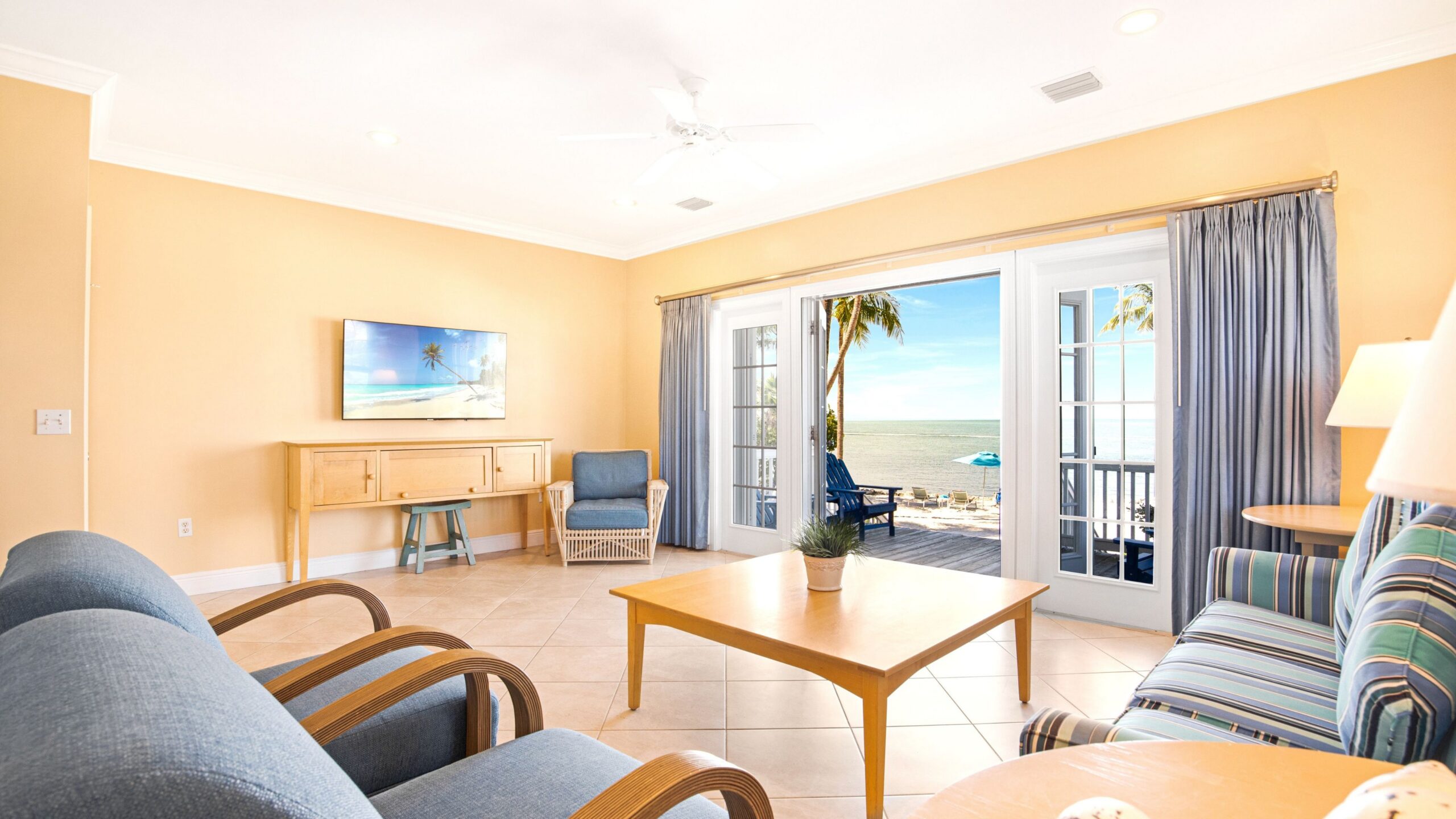 The living room of a 3-Bedroom Beachfront Villa at Tranquility Beach Beachfront Resort, in the Florida Keys.
