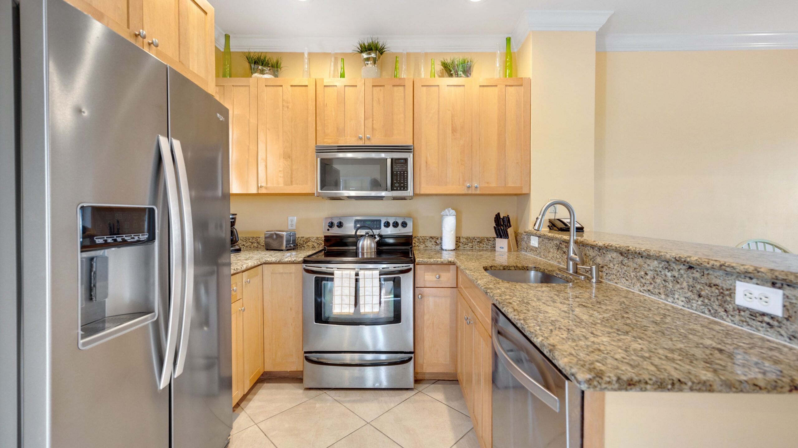The kitchen of a 3-Bedroom Waterfront Villa at Tranquility Beach Beachfront Resort, in the Florida Keys.