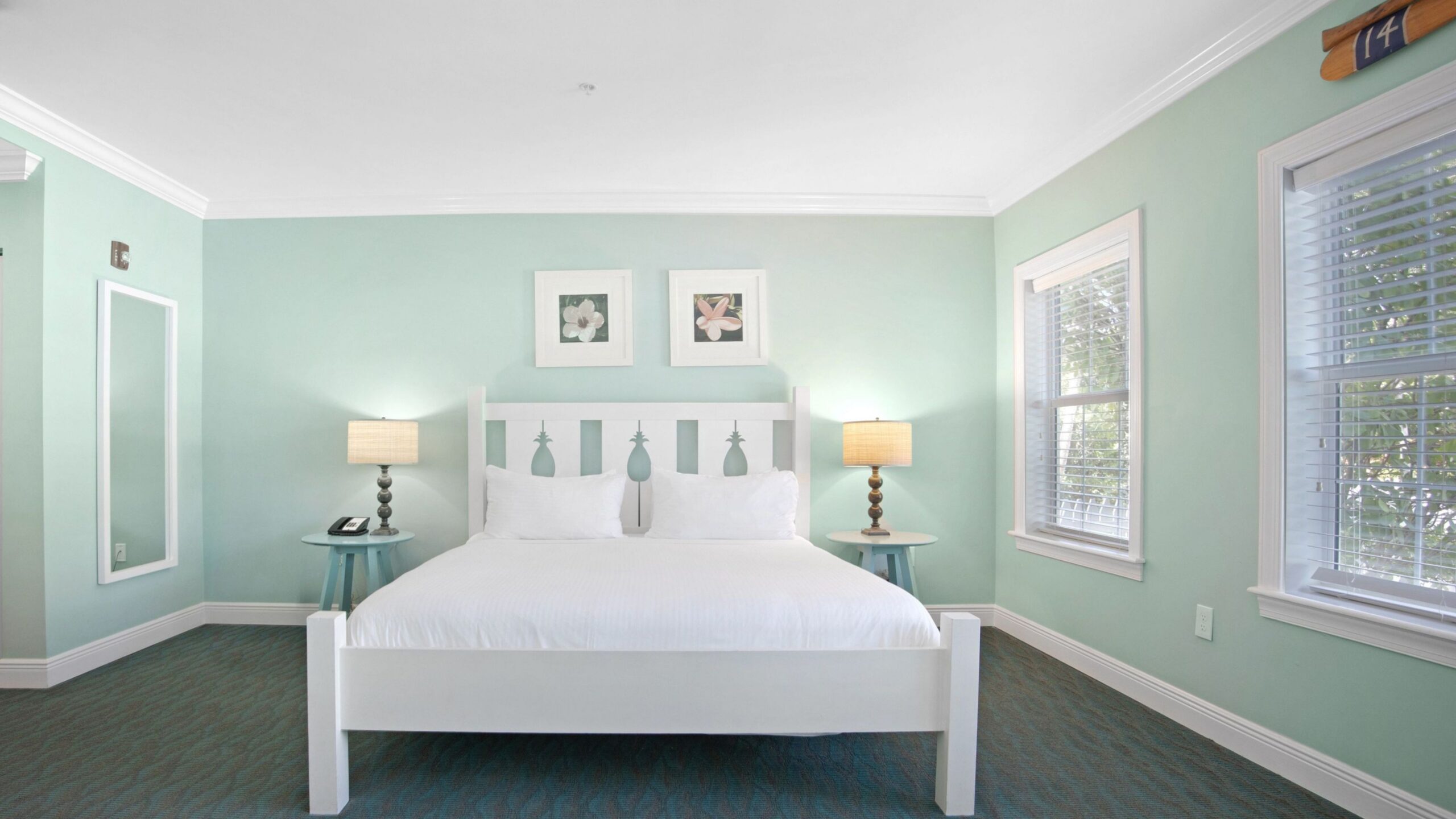 Bedroom of an Accessible Ground-Floor Tropical Garden King Hotel Room at Tranquility Bay Beachfront Resort, in the Florida Keys.