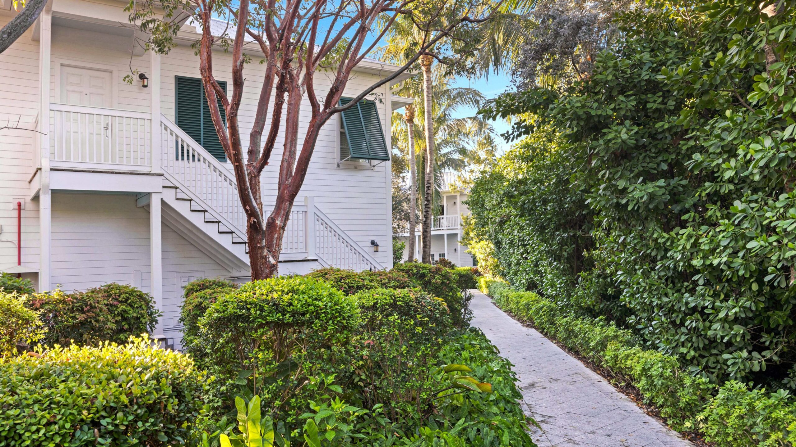 Exterior of an Accessible Ground-Floor Tropical Garden King Hotel Room at Tranquility Bay Beachfront Resort, in the Florida Keys.