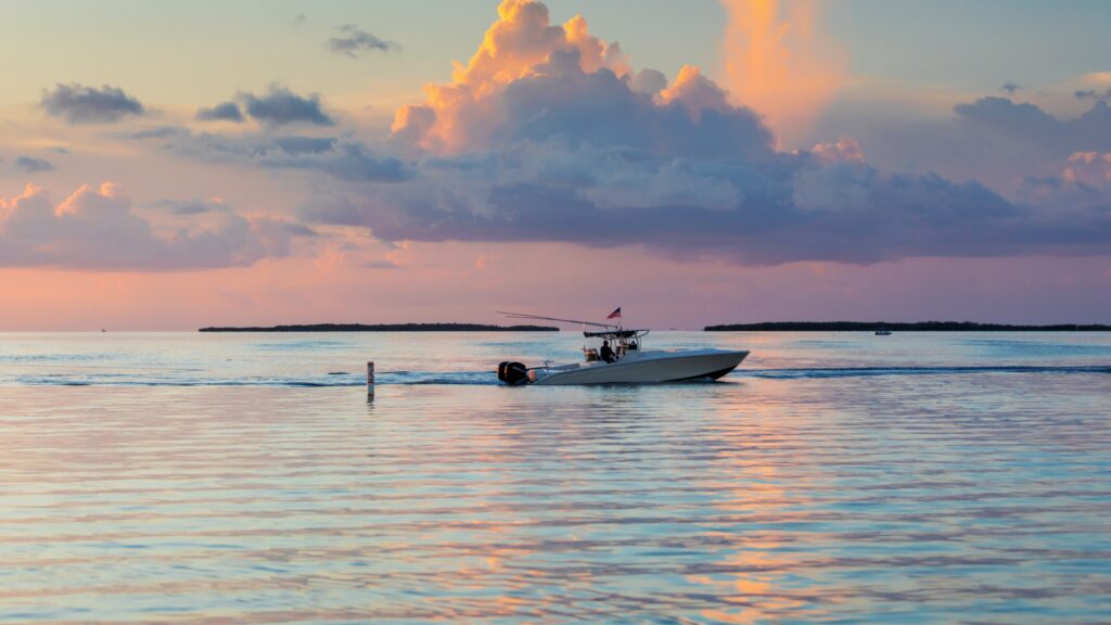 A fishing charter on the water at sunrise in the Florida Keys.