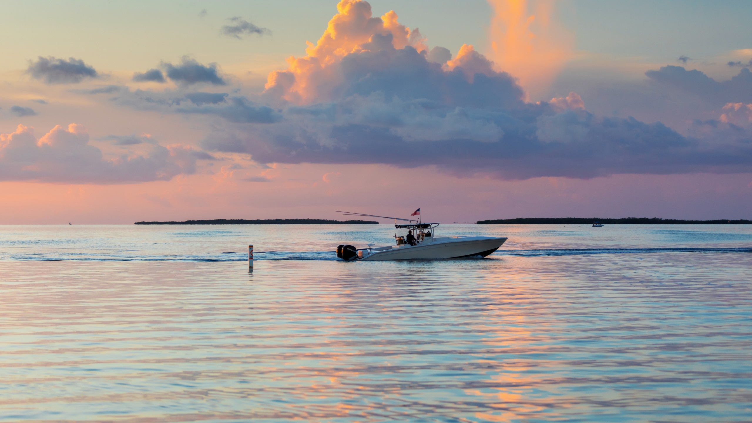 A fishing charter on the water at sunrise in the Florida Keys.