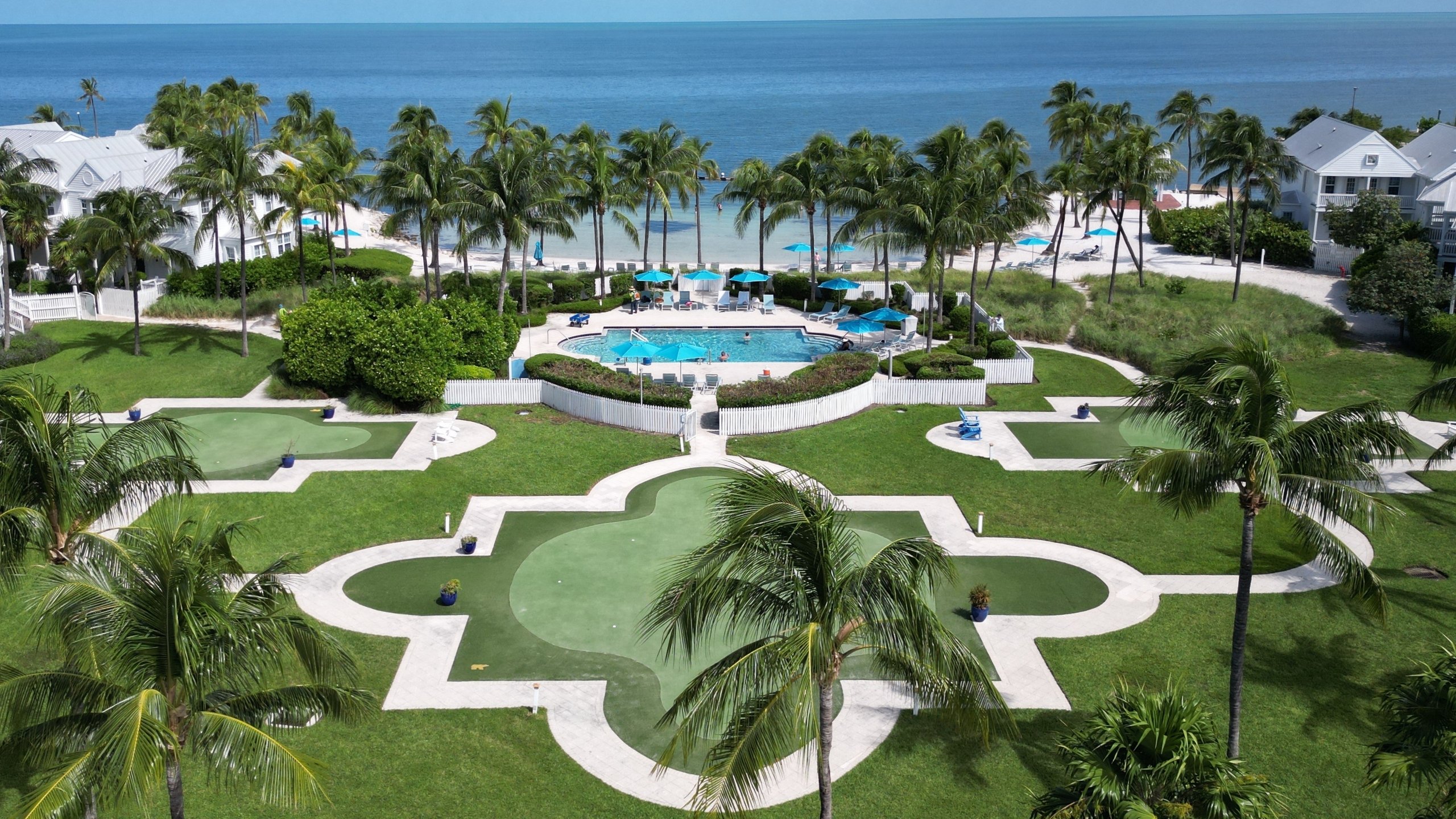 An aerial view of the Nicklaus Designed putting green and adults' only pool at Tranquility Bay Beachfront Resort, in the Florida Keys.