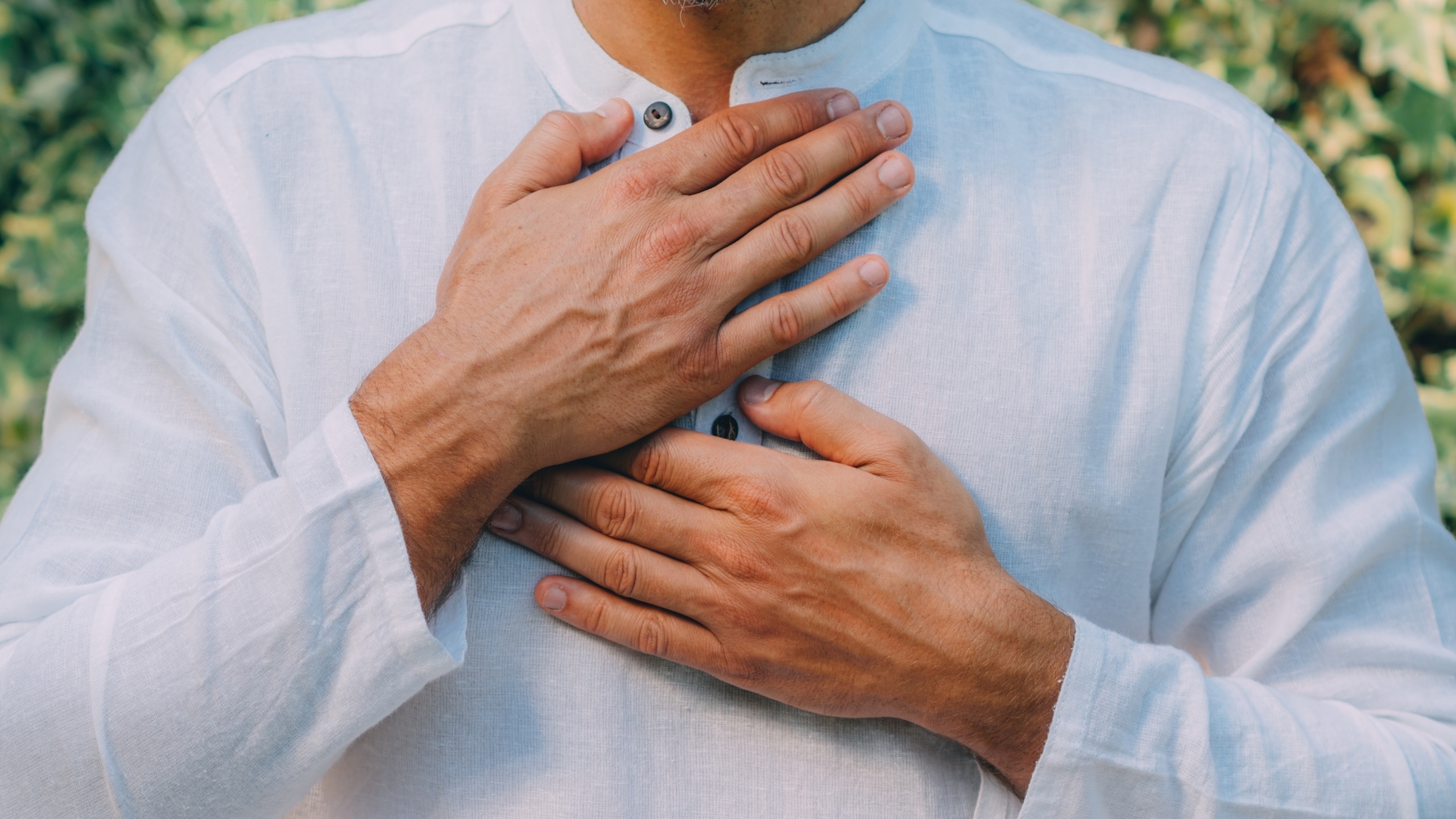 A man does Reiki at Tranquility Bay Beachfront Resort, in the Florida Keys.