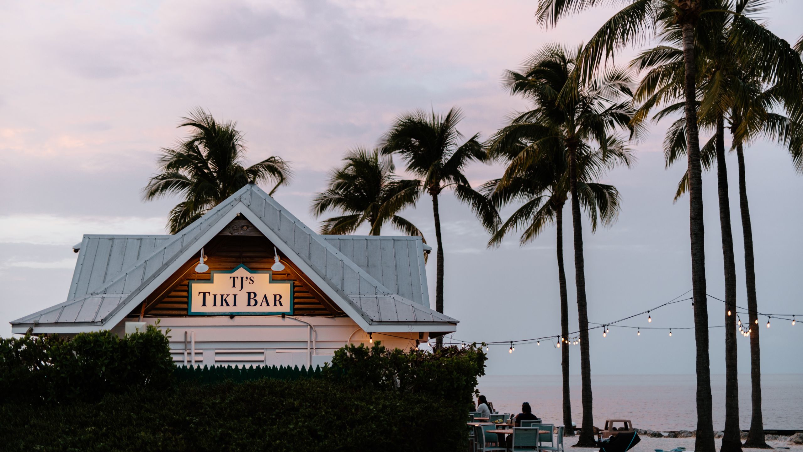 Tj's Tiki Bar Evening Exterior at Tranquility Bay Beachfront Resort, in the Florida Keys.