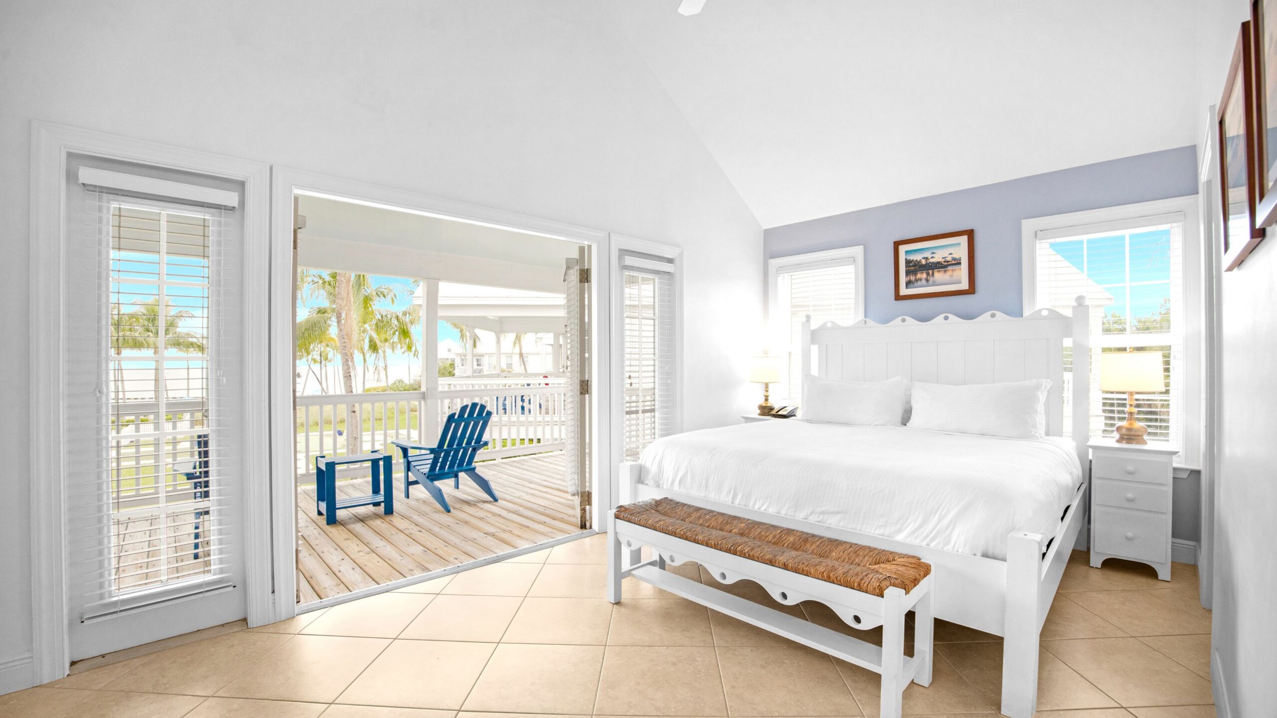 The primary king suite in a 3-Bedroom Waterview Villa at Tranquility Bay Beachfront Resort, in Marathon, FL.